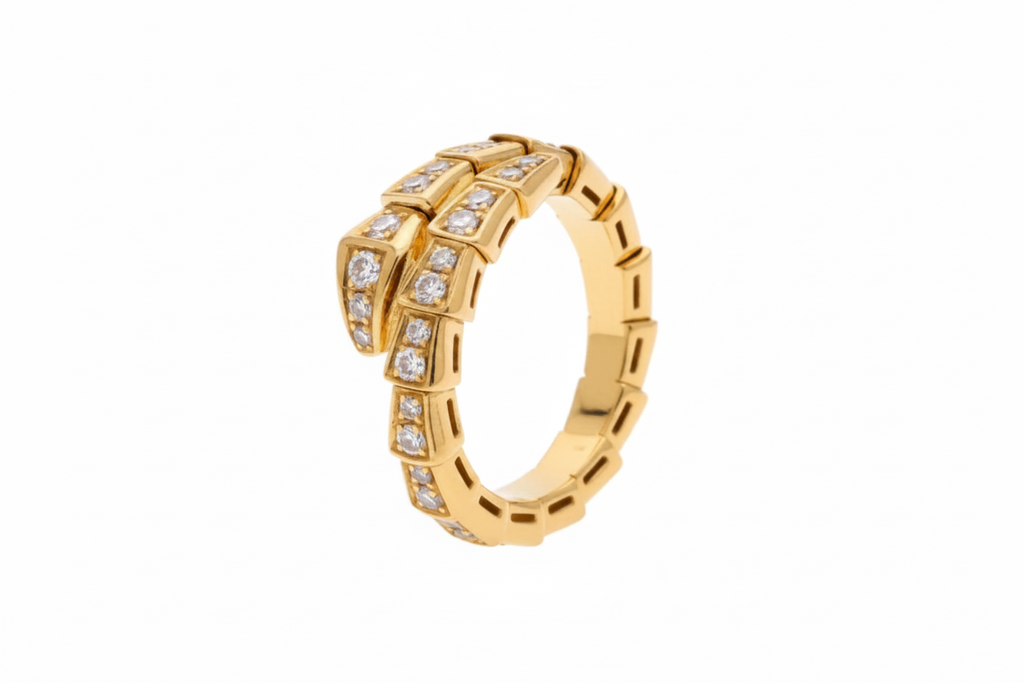SERPENS ring i silver och guld med kristalldetaljer
