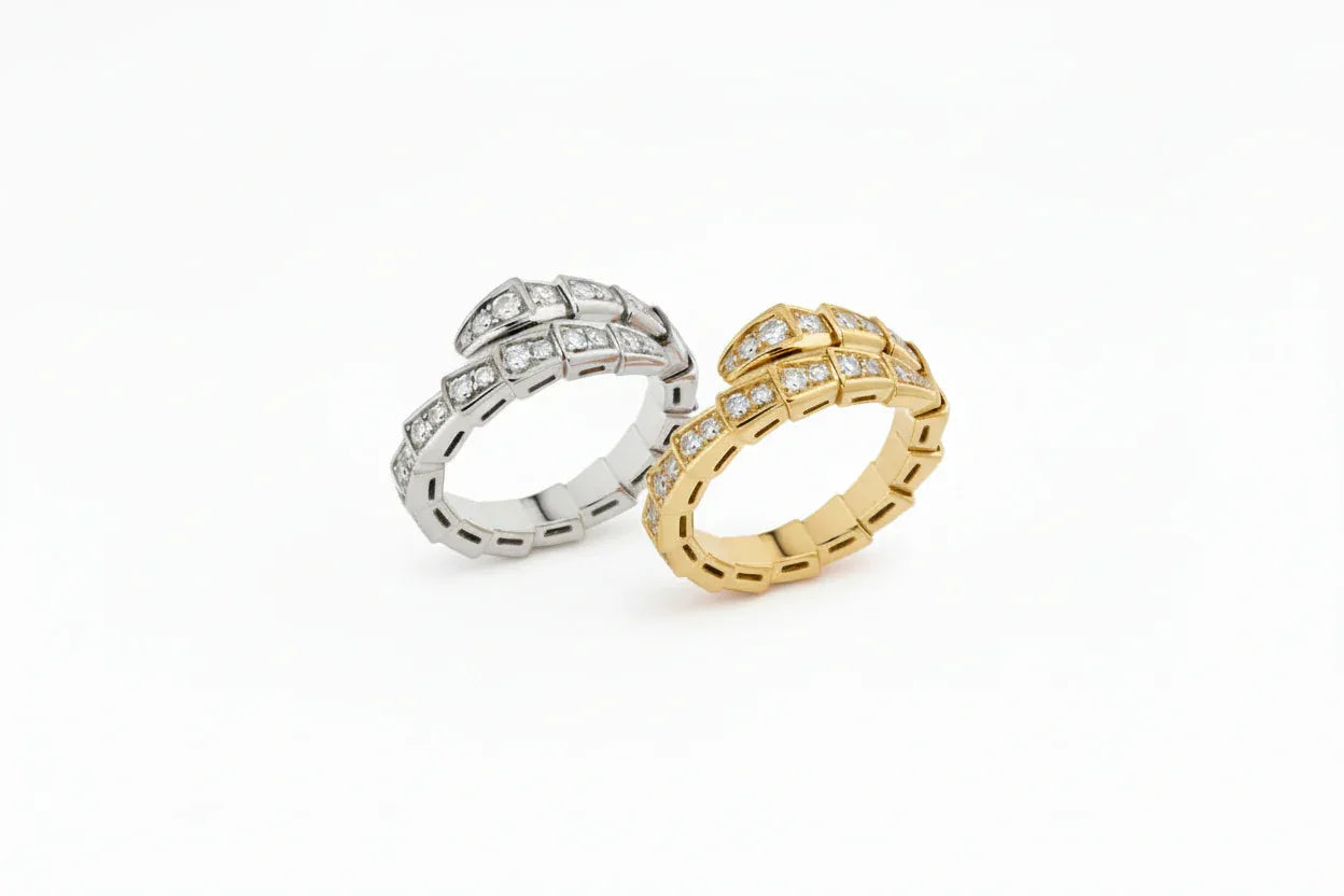 SERPENS ring i silver och guld med kristalldetaljer