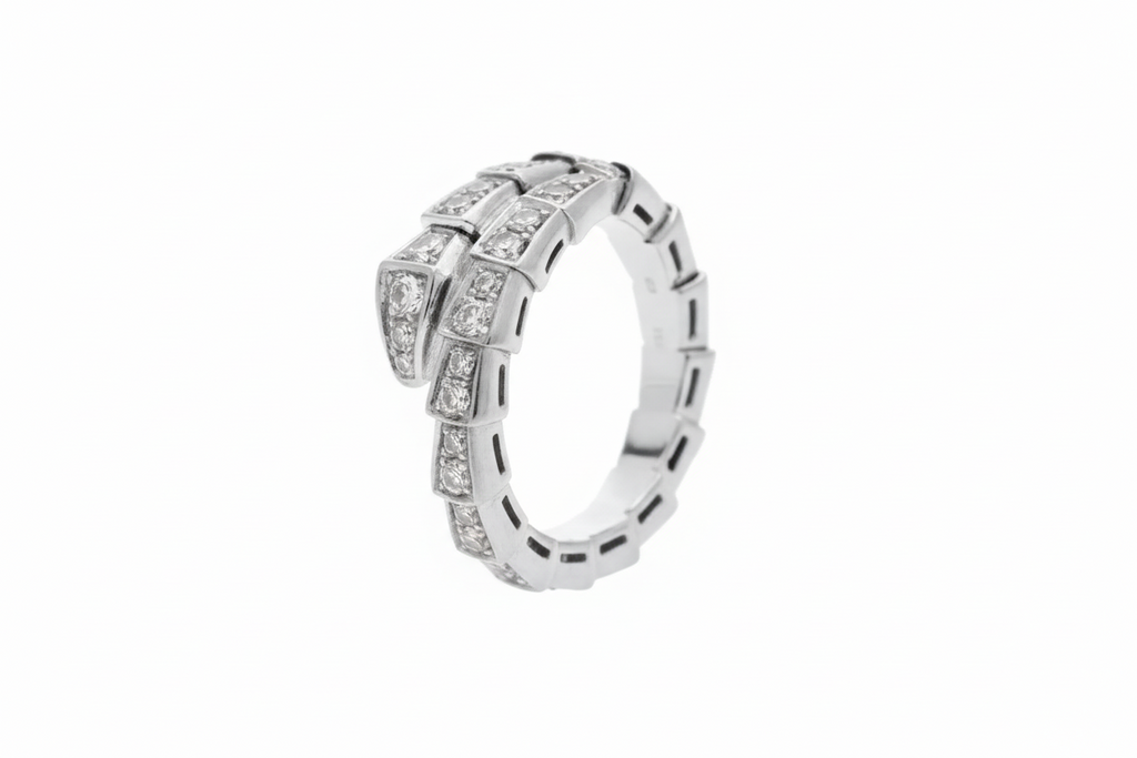 SERPENS ring i silver och guld med kristalldetaljer